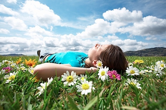 A Man Laying on the Grass Dreaming  - Photo courtesy of ©iStockphoto.com/ALEAIMAGE, Image #5724729